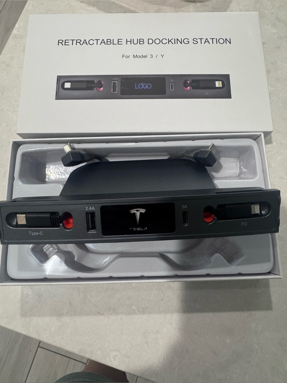 Tesla Model Y/Model 3 compatible retractable charging station.